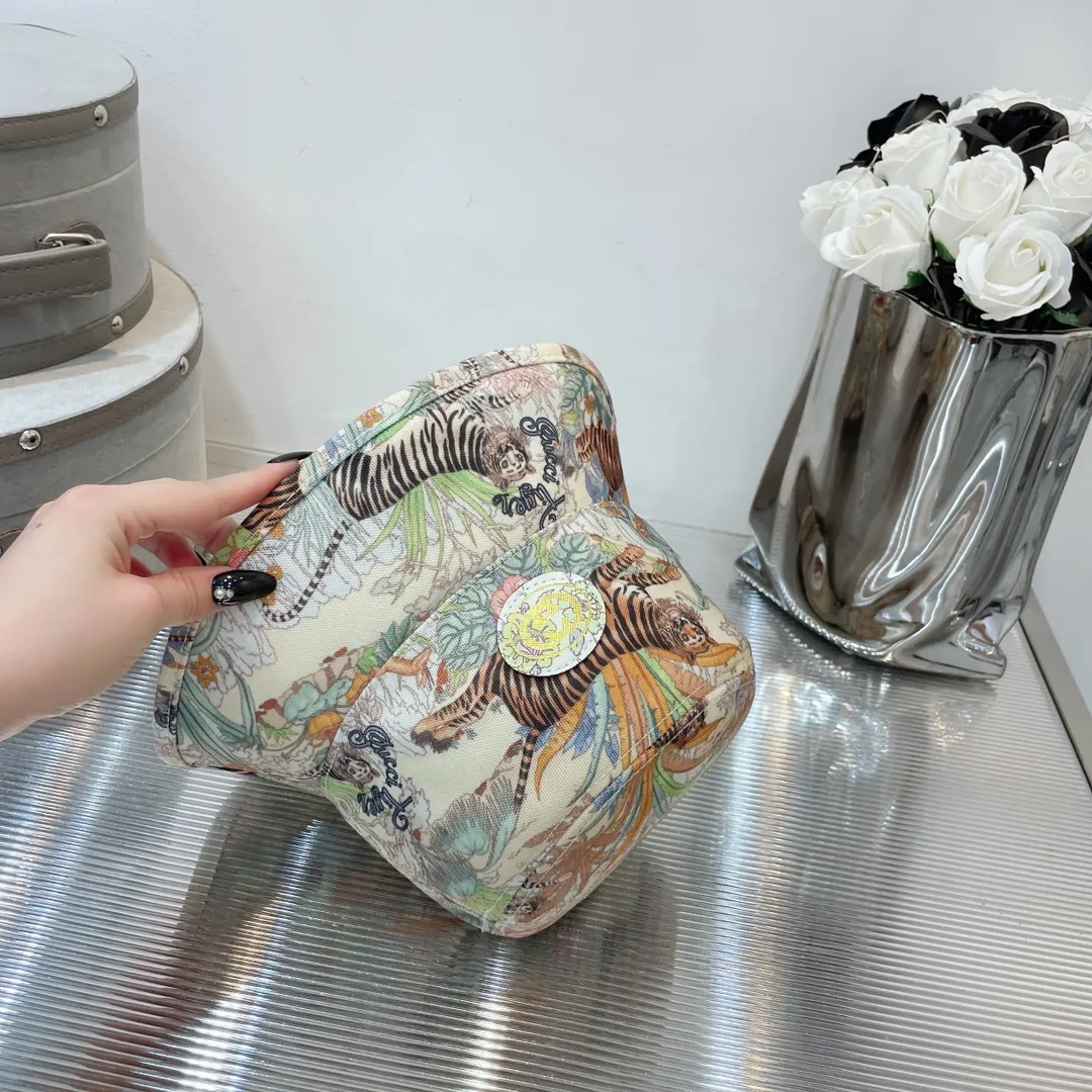 Special batch of 80 Gucci animal print canvas bucket hats. Customized for the Year of the Tiger. Rich natural world atmosphere. Fresh, unique, and limited to summer.