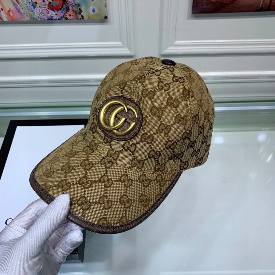 🉐100 Comes with a packaging bag, Gucci's new original baseball cap, metal double G, the latest model at the counter, 1:1 custom molding, genuine molding hardware, original canvas fabric + first-layer cowhide, original factory quality! The quality is great, the basic head circumference is 56cm, and the patch is adjustable.