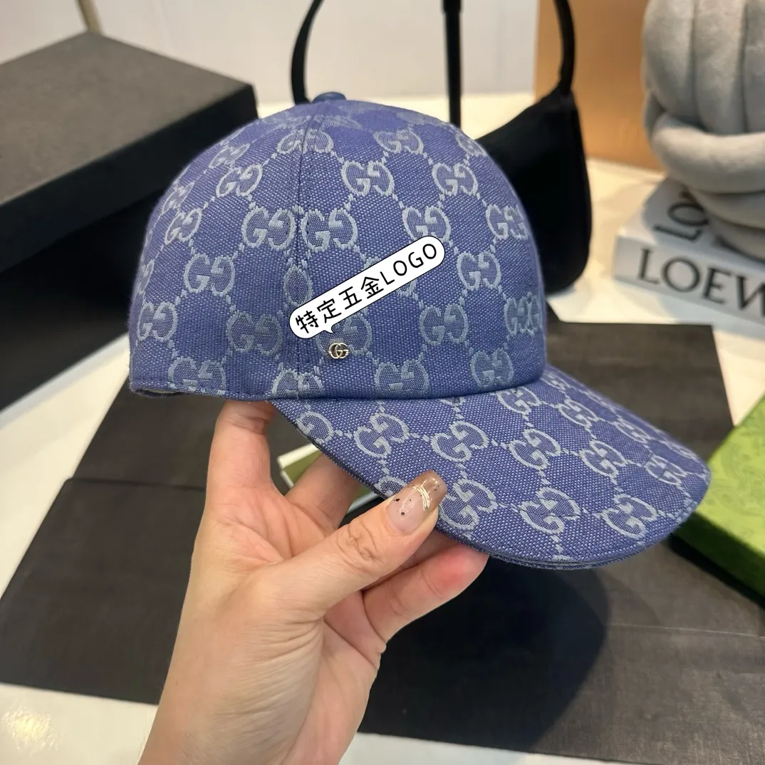 P240 Gucci Baseball Cap 🧢 Archive graphics shine in fashionable items with bold brand logos. This baseball cap is crafted from the brand's recognizable GG canvas fabric, with tonal leather details and an adjustable buckle adding to the appeal. ·Blue and gray GG cotton canvas·Blue leather trim·Adjustable Velcro closure ·70% cotton, 30% polyester; 65% cotton, 35% linen (lining); 55% cotton 45% viscose (backside); Cow leather (detail); Cow leather (leather trim)