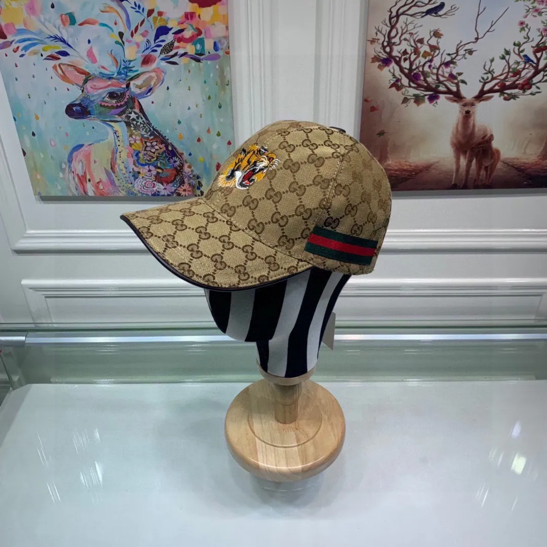 🉐130 Gucci (Gucci) new original baseball cap, tiger head embroidery, 1:1 mold customization, heavy embroidery, details comparable to counters, original canvas + first-layer cowhide, excellent quality! The first choice for handsome men and beautiful women, fashionable and versatile. The basic head circumference is 56cm, and the patch is adjustable.