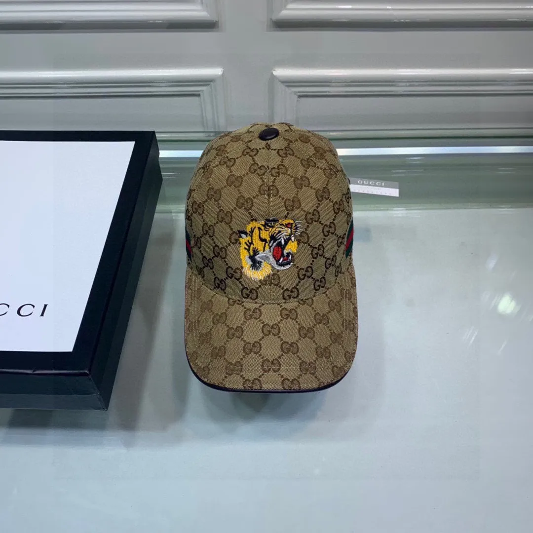 🉐130 Gucci (Gucci) new original baseball cap, tiger head embroidery, 1:1 mold customization, heavy embroidery, details comparable to counters, original canvas + first-layer cowhide, excellent quality! The first choice for handsome men and beautiful women, fashionable and versatile. The basic head circumference is 56cm, and the patch is adjustable.