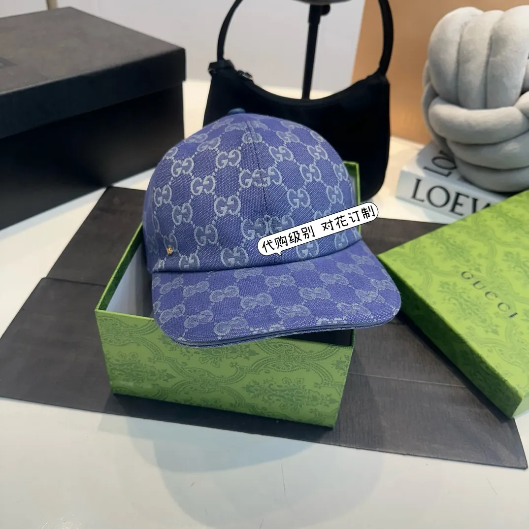 P240 Gucci Baseball Cap 🧢 Archive graphics shine in fashionable items with bold brand logos. This baseball cap is crafted from the brand's recognizable GG canvas fabric, with tonal leather details and an adjustable buckle adding to the appeal. ·Blue and gray GG cotton canvas·Blue leather trim·Adjustable Velcro closure ·70% cotton, 30% polyester; 65% cotton, 35% linen (lining); 55% cotton 45% viscose (backside); Cow leather (detail); Cow leather (leather trim)