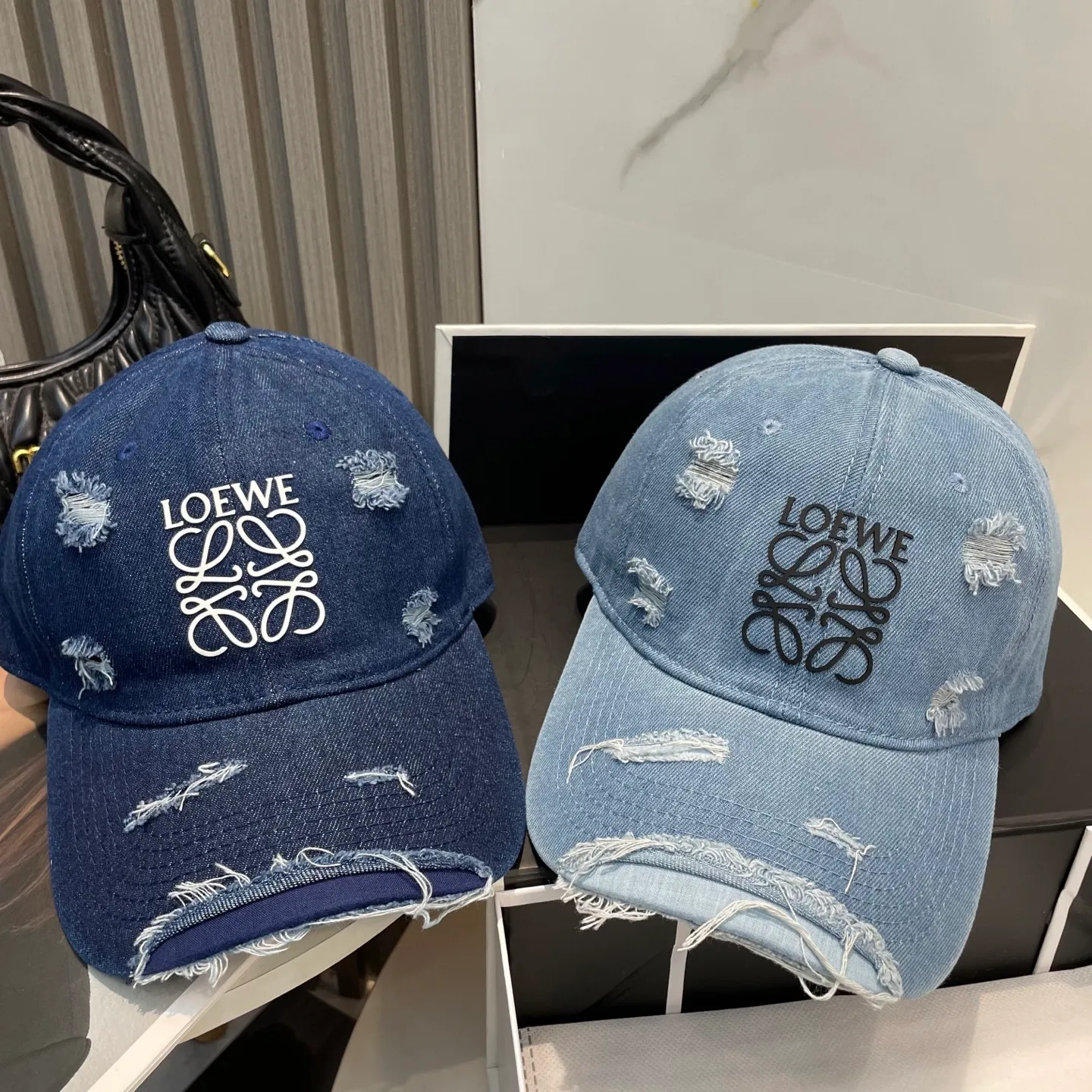 P66 Loewe new washed distressed ripped denim baseball cap Newly launched washed denim series, casual and versatile wardrobe matching artifact