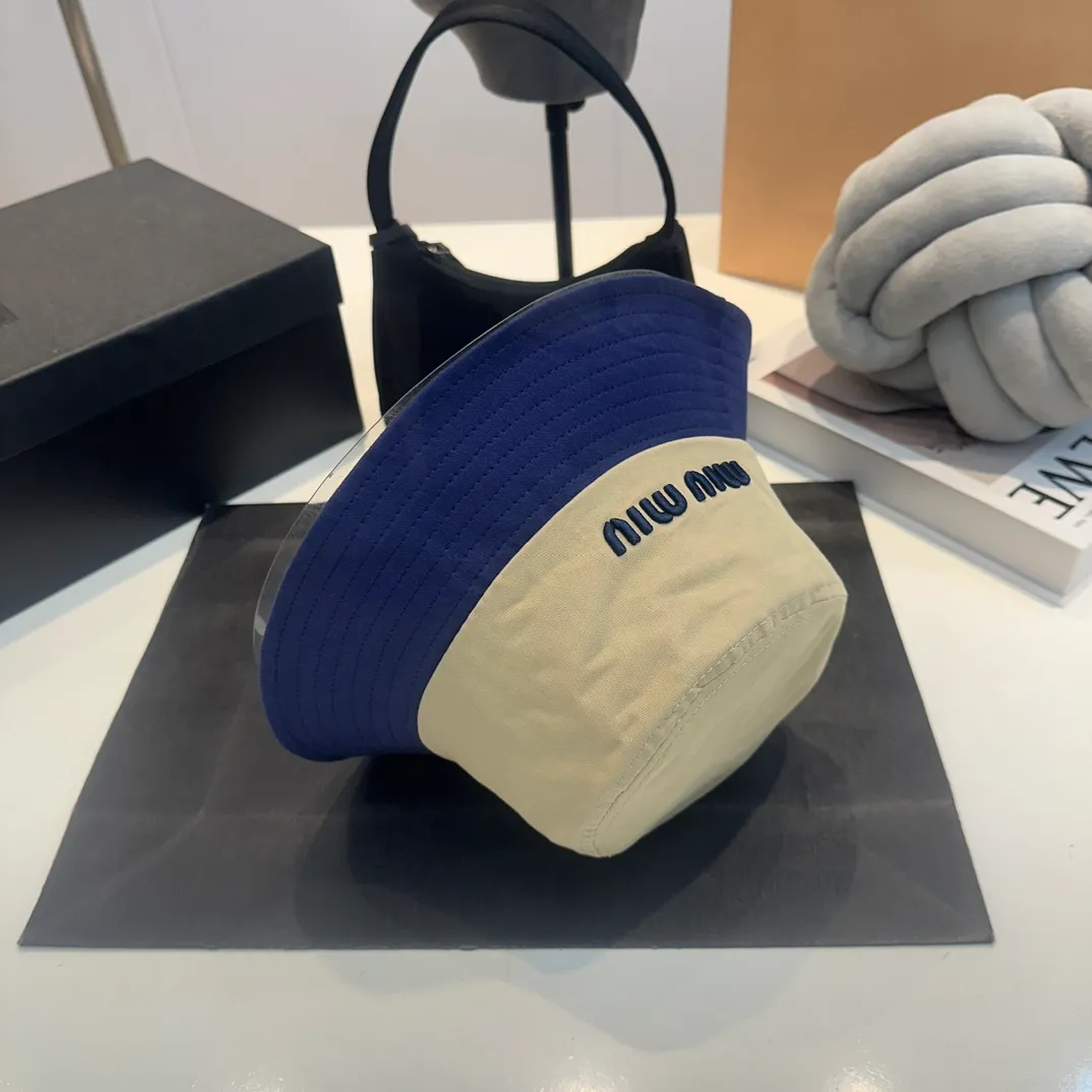P56 MiuMiu Miu Miu girl's daily bucket hat. A very versatile baseball cap. Classic embroidered logo. Versatile and fashionable.