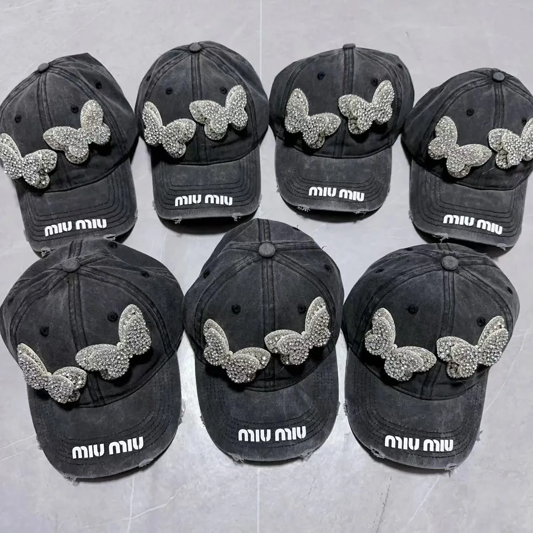 Miumiu Distressed Distressed Butterfly Diamond Baseball Cap