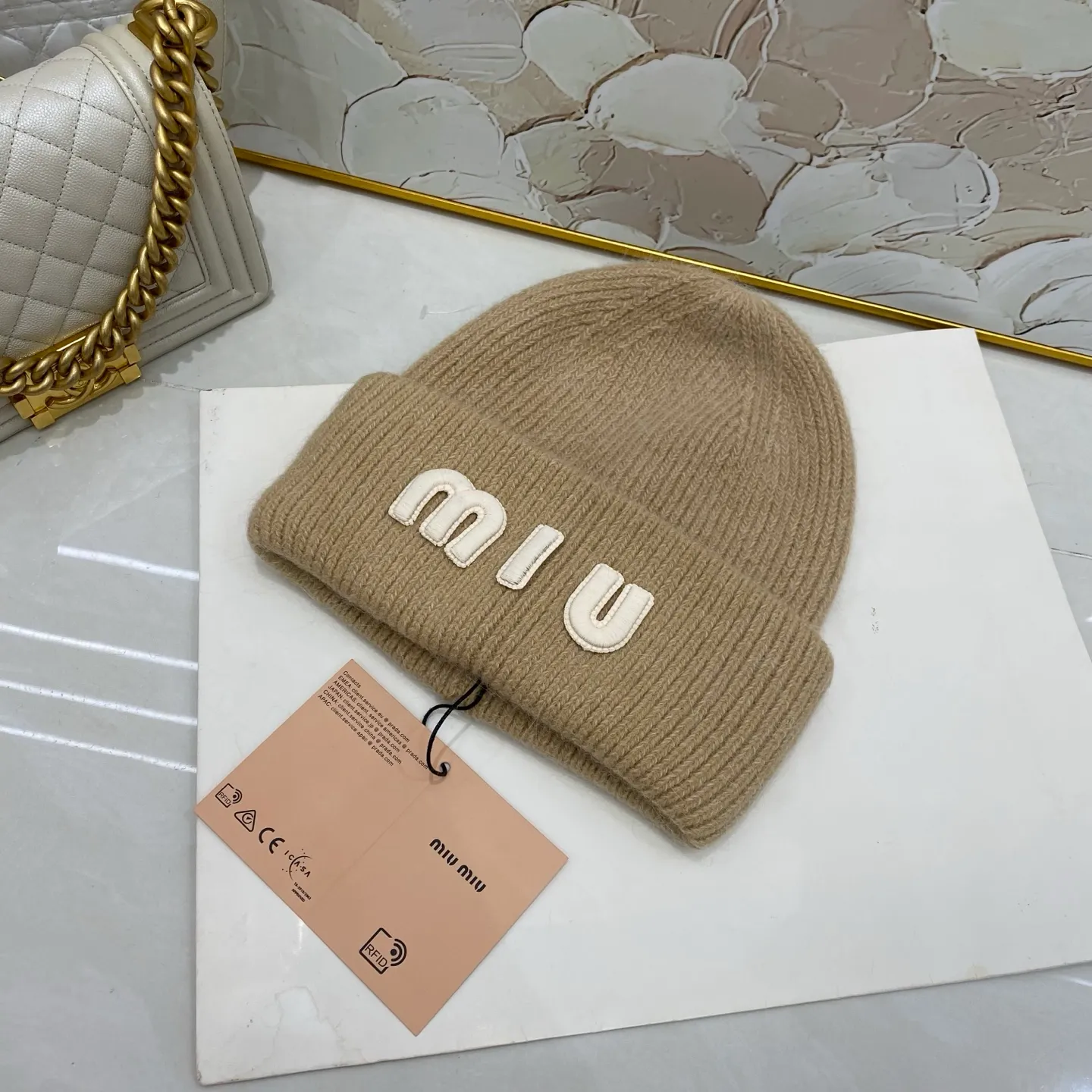 MiuMiu rabbit fur knitted hat