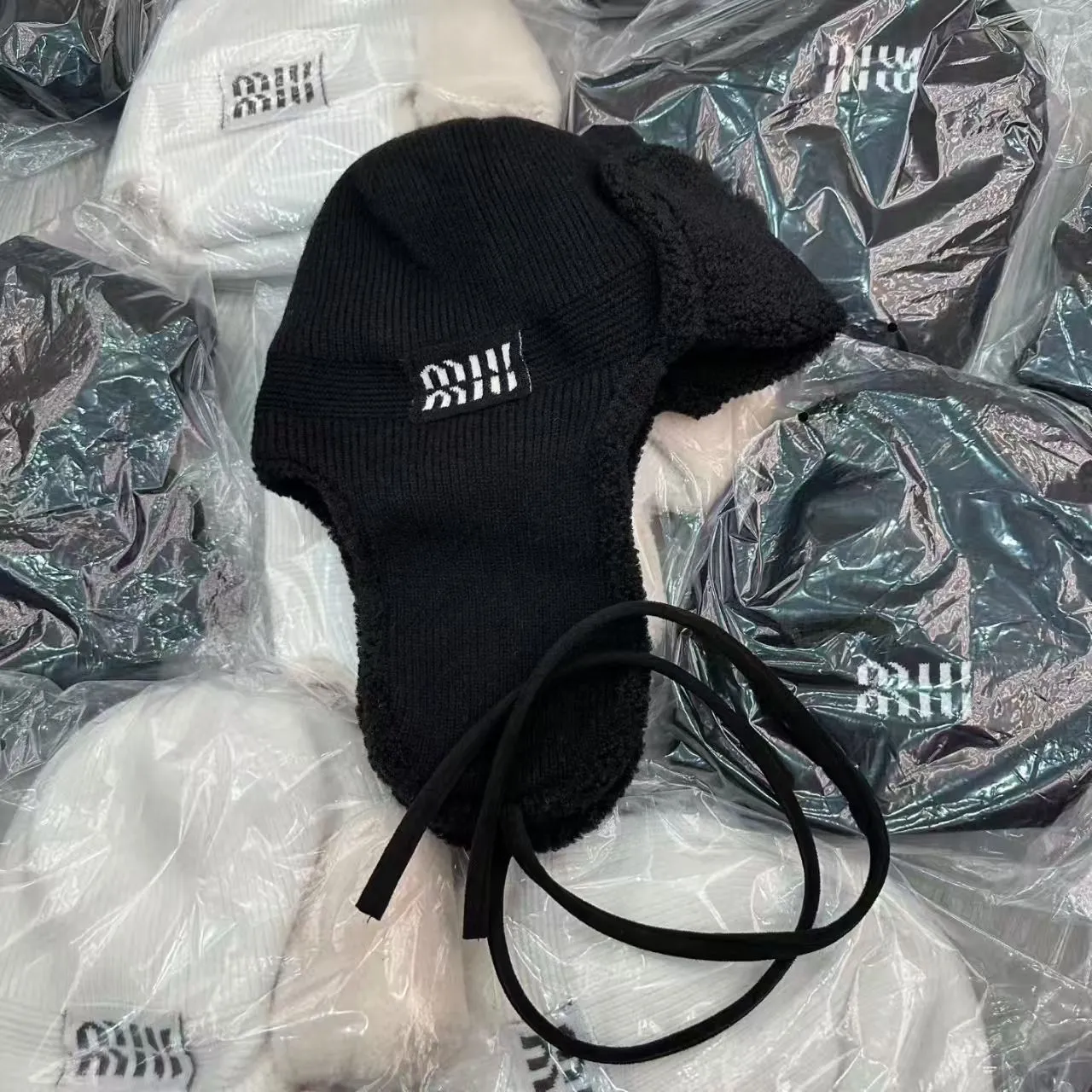 miumiu high version ear protection hat Lei Feng hat