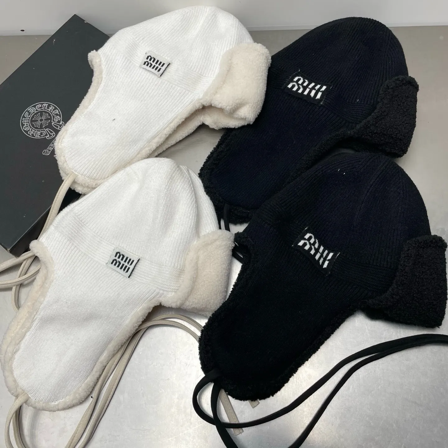 miumiu high version ear protection hat Lei Feng hat