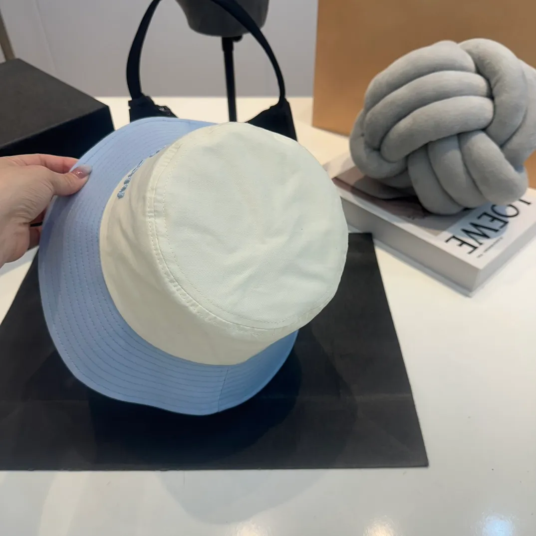 P56 MiuMiu Miu Miu girl's daily bucket hat. A very versatile baseball cap. Classic embroidered logo. Versatile and fashionable.