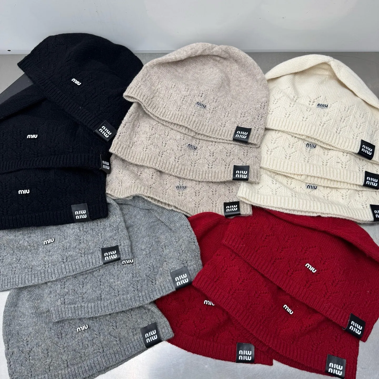 miumiu ripped heap knitted hat