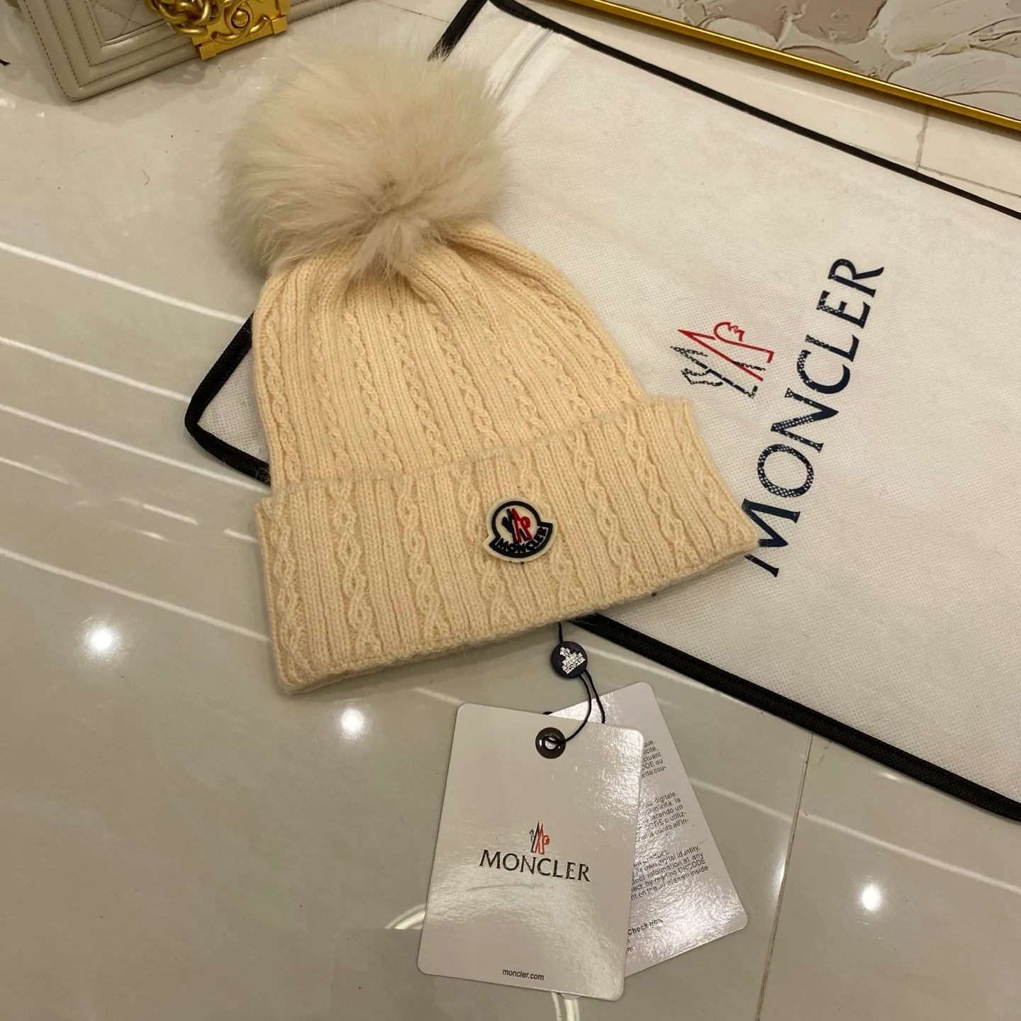 MONCLER rabbit hair twist knitted hat