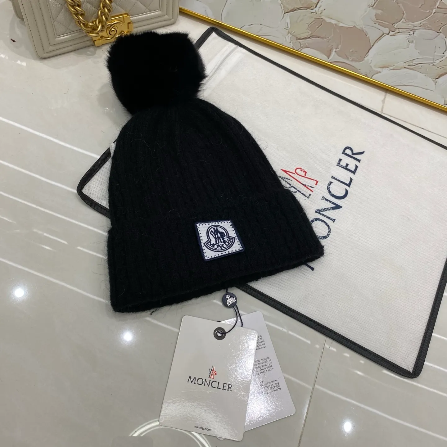 MONCLER rabbit hair twist knitted hat