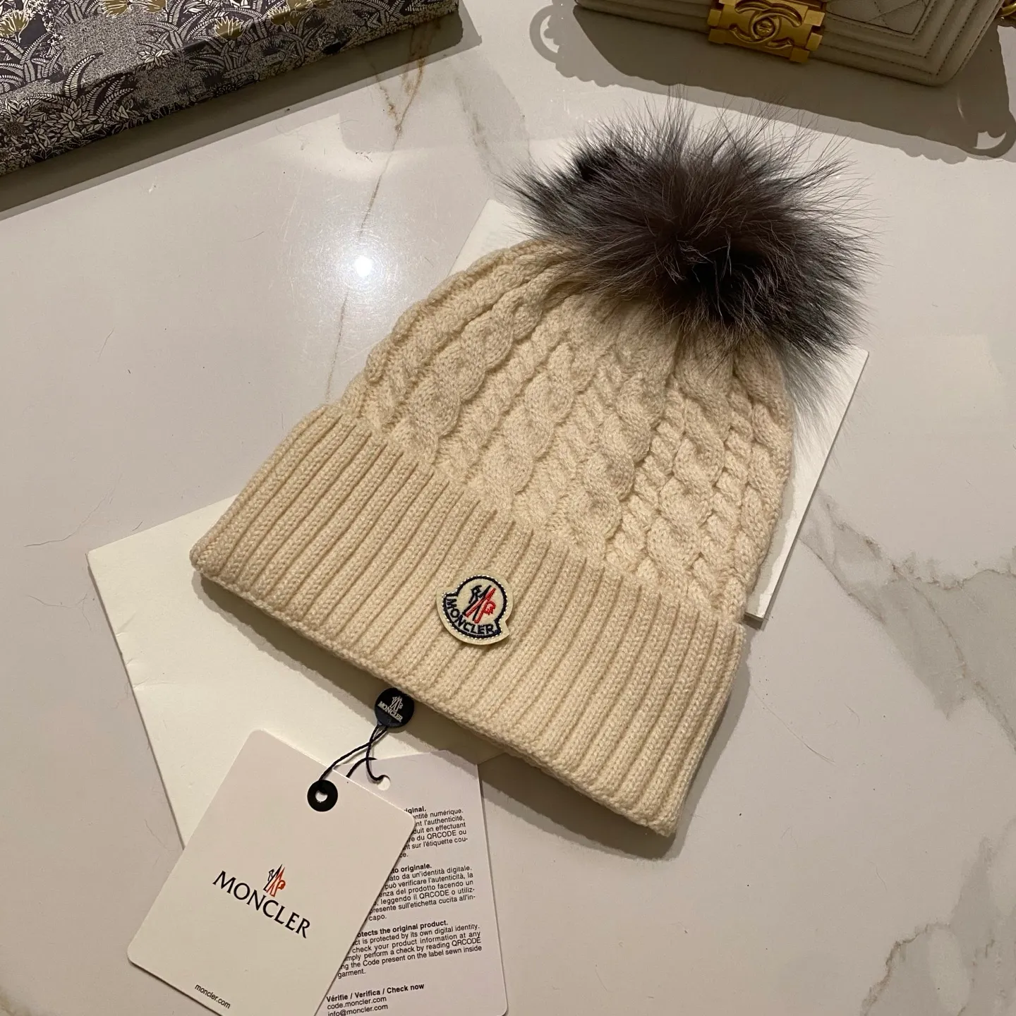 Moncler Mouth Covered Cashmere Twist Knitted Hat + Black Fox Fur Ball
