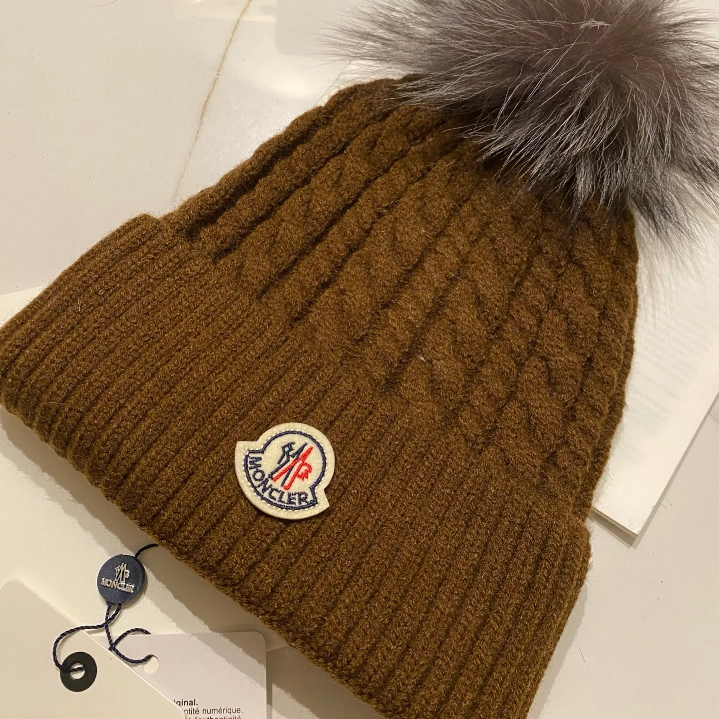 Moncler Mouth Covered Cashmere Twist Knitted Hat + Black Fox Fur Ball