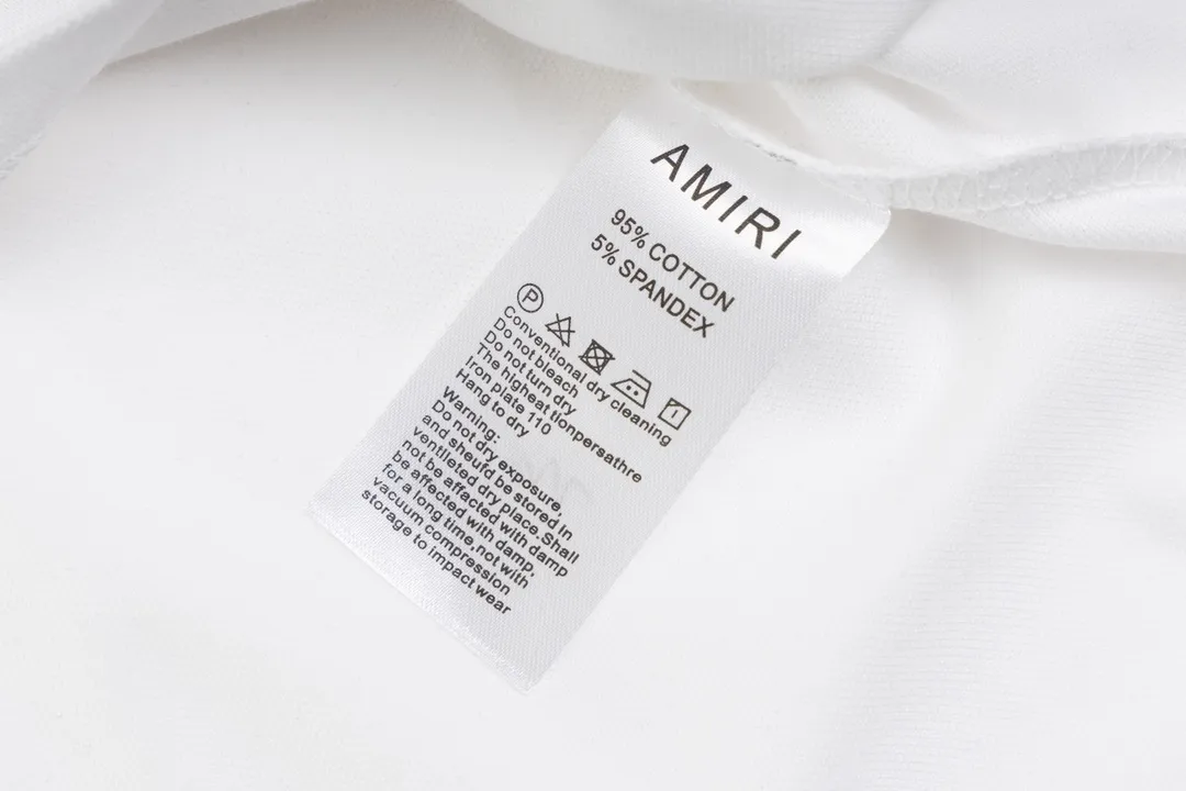 P180 AMIRI/Amiri, the American fashion brand's 2025 spring and summer Polo shirt, the same style is sold at the counter, customized fabrics, excellent texture, contrasting color splicing, ready-made clothes with stylish drapes, comfortable to wear and skin-friendly, heavy workmanship to create the original logo, complete three labels, excellent upper body effect, original purchase, a must-have for men's wardrobe. Color: White Size: M-3XL