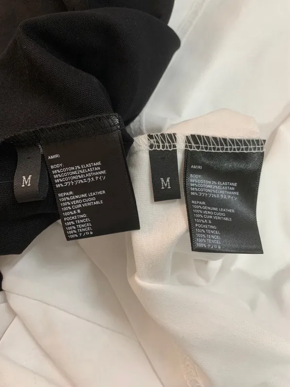 689 model P120 AMIRI real shot black white hanging S. M. L. XL