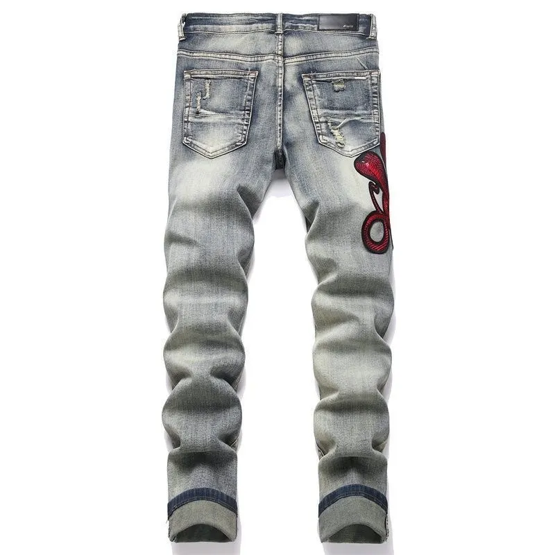 P168 💰 AMIRI patch embroidery jeans trousers AMIRI high street basic ripped tight elastic jeans trousers amiri brand jeans break the production process and cutting of the original jeans, the fabrics are softer and more comfortable Hand-sewn collar label Customized logo buttons Genuine leather tag Color: Picture color Size: 30-32-34-36
