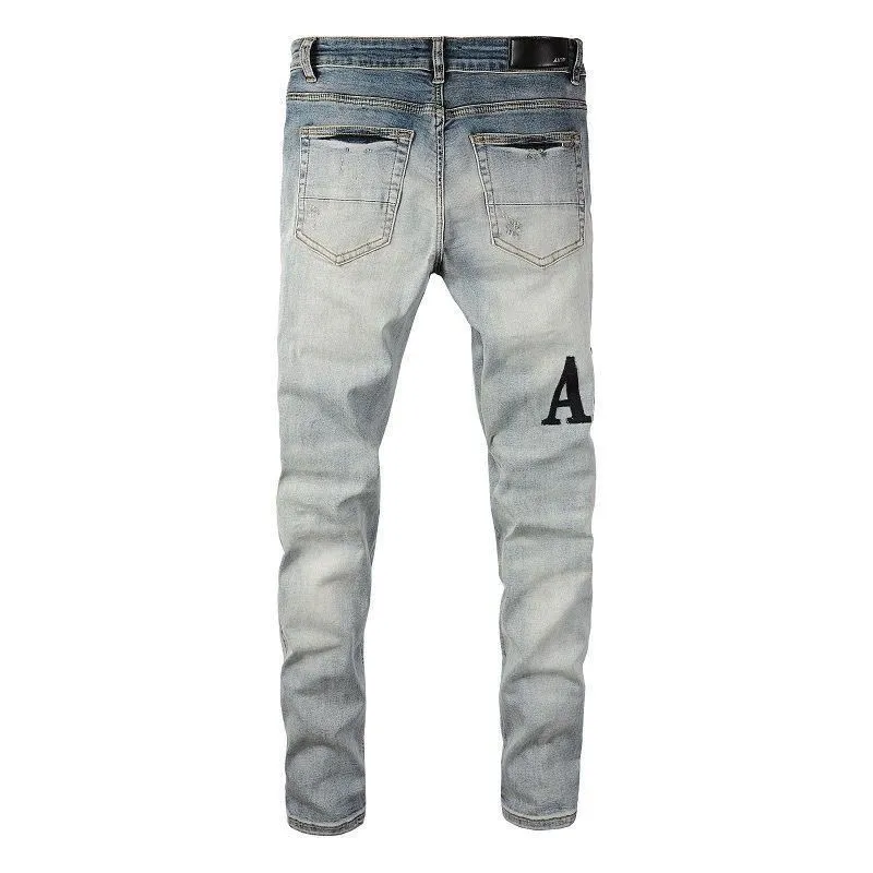 P180 Top replica AMIRI splash-ink medal patch embroidered jeans trousers AMIRI high street basic ripped tight stretch jeans trousers Amiriamiri is transliterated as Emil, which is the name of the founder. Mike Amiri, the founder of amiri, grew up in Los Angeles, USA. He was influenced by the local street culture Rock since he was a child, so he founded the amiri brand named after himself. A variety of trendy brand clothing meets the needs of different fashion players. Amiri clothing has novel and unique styles and is a well-known street brand in the United States. Many of its styles and styles are loved by many street photographers. Various clothing styles meet the needs of different people, show their unique temperament, and show the trend of dressing. amiri's jeans are relatively famous. Not only do they have many styles, but the quality of the jeans is also very good. Many celebrities have also worn amiri brand jeans.  The jeans of the amiri brand break through the production process and cutting of the original jeans. The fabrics are relatively soft and comfortable, and are not as hard as some jeans, which can irritate the skin and cause the skin to bleed when worn. Los Angeles trendy brand Amiri's jeans are made with great detail from tailoring to texture, adding wrinkles, bullet holes, damage and other details to add to the trendiness of the jeans. You can choose the style that suits you according to your own needs. Only when you wear a suitable style can you have a certain sense of fashion.  In recent years, high street has become a word that appears more and more frequently in men's clothing. High street style has also become an important direction for everyone's matching. High street related items are basically inseparable from oversize or off-shoulder tops. The lower body is matched with trackpants or tight-fitting denim. In my opinion, the most representative one is perhaps annihilation. Color; picture color Size: m l xl xxl