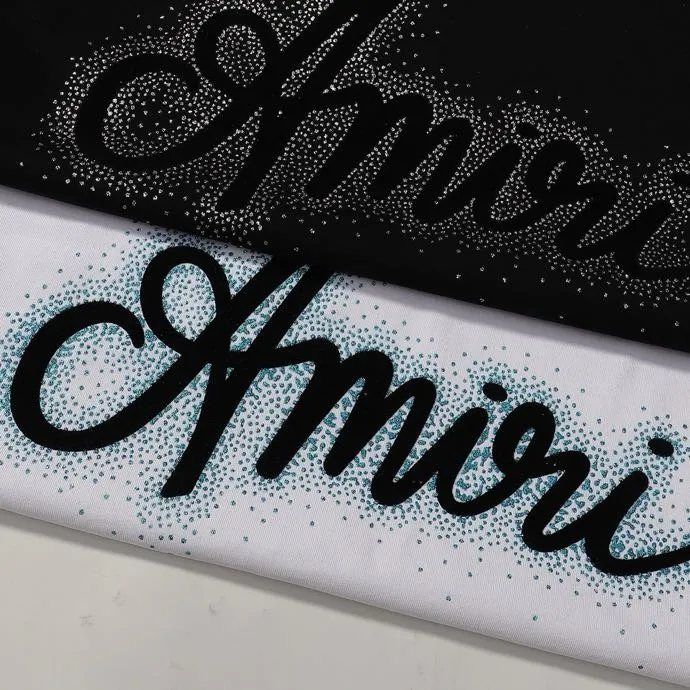 Style number: 715 P126 Fabric: 260g double yarn AMIRI 2025 spring and summer new logo round neck T-shirt high street men and women loose classic letter silver glitter short sleeves Color: black. White Size: S M L XL