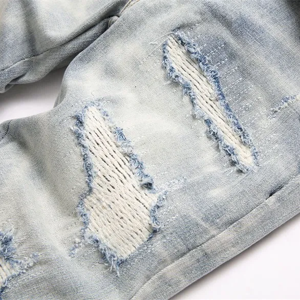 P180 Top replica AMIRI jeans trousers AMIRI high street basic ripped tight stretch jeans trousers Amiriamiri is transliterated as Emil, which is the name of the founder. Mike Amiri, the founder of amiri, grew up in Los Angeles, USA, and was influenced by the local street culture Rock since he was a child. Therefore, he founded the amiri brand named after himself. A variety of trendy clothing meets the needs of different fashion players. Amiri clothing has novel and unique styles and is a well-known street brand in the United States. Many of its styles and styles are loved by many street photographers. Various clothing styles meet the needs of different people, show their unique temperament, and show the trend of dressing. amiri's jeans are relatively famous. Not only do they have many styles, but the quality of the jeans is also very good. Many celebrities have also worn amiri brand jeans.  The jeans of the amiri brand break through the production process and cutting of the original jeans. The fabrics are relatively soft and comfortable, and are not as hard as some jeans, which can irritate the skin and cause the skin to bleed when worn. Los Angeles trendy brand Amiri's jeans are made with great detail from tailoring to texture, adding wrinkles, bullet holes, damage and other details to add to the trendiness of the jeans. You can choose the style that suits you according to your own needs. Only when you wear a suitable style can you have a certain sense of fashion.  In recent years, high street has become a word that appears more and more frequently in men's clothing. High street style has also become an important direction for everyone's matching. High street related items are basically inseparable from oversize or off-shoulder tops. The lower body is matched with trackpants or tight-fitting denim. In my opinion, the most representative one is perhaps annihilation. Color; picture color Size: m l xl xxl