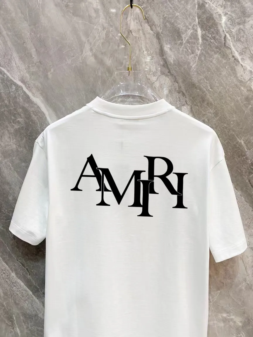 P150 AMIRI 2025 spring and summer new style debut counter, the latest short-sleeved round neck T-shirt, high-end custom design, avant-garde and fashionable! The brand logo is designed with heavy craftsmanship printing, 250 grams of Xinjiang long-staple cotton fabric, comfortable to wear. Counter-level exquisite stitching. Fine workmanship. The upper body effect is incomparably handsome! A must-have item for a stylish man! Color: Black White Size: S-2XL (sub-size) Slightly wide version Size: S M L Due to manual measurement, there is a deviation of about 1-3CM in the size, please forgive me.