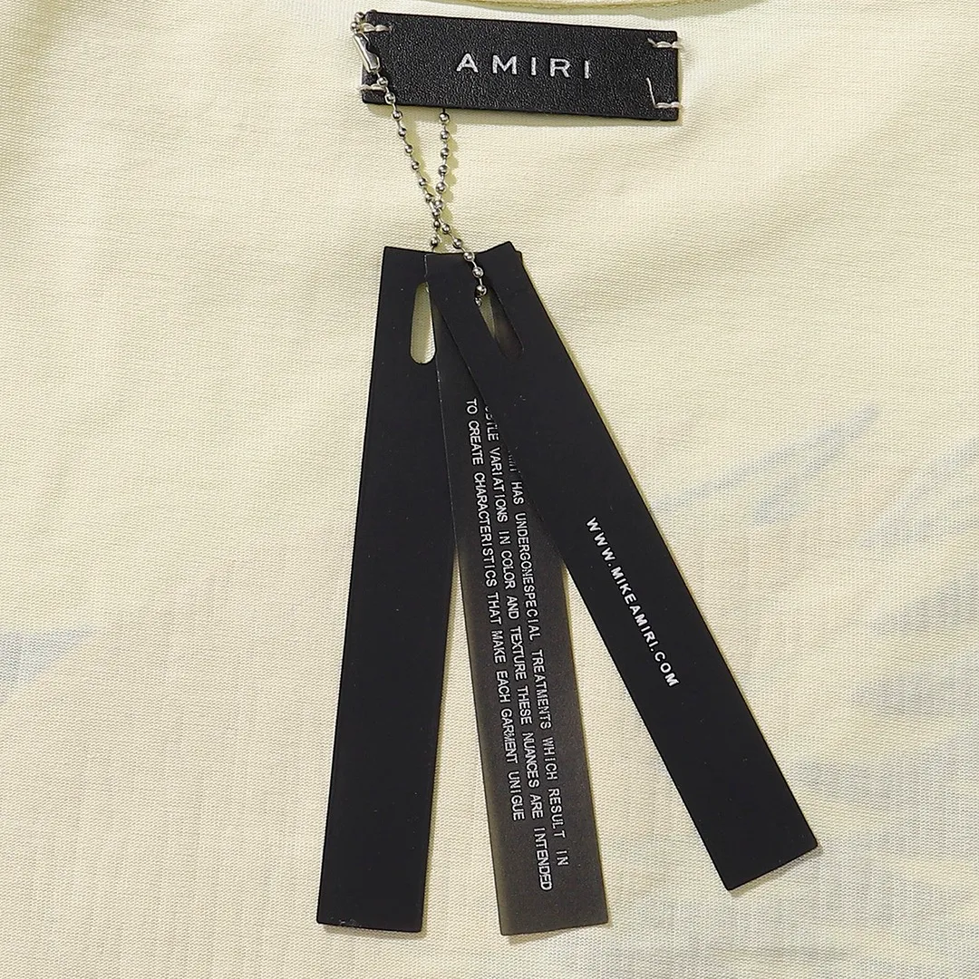 P114 Fabric: 260g double yarn AMIRI 2025 spring and summer new logo round neck T-shirt high street same style for men and women loose classic letter printed short sleeves Color: black. Apricot Size: S M L XL