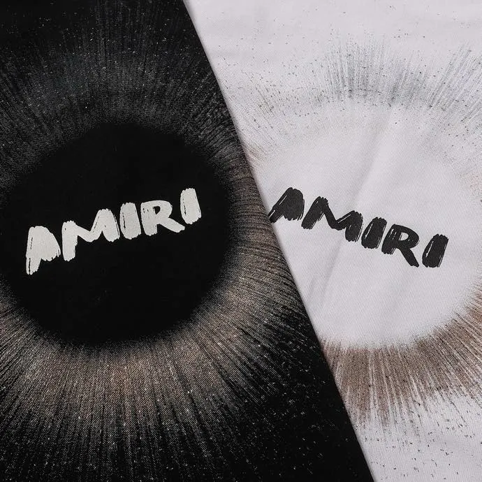 Style number: 725 P126 Fabric: 260g double yarn AMIRI 2025 spring and summer new logo round neck T-shirt high street unisex loose classic letter sun black hole star short sleeve Color: black. White Size: S M L XL