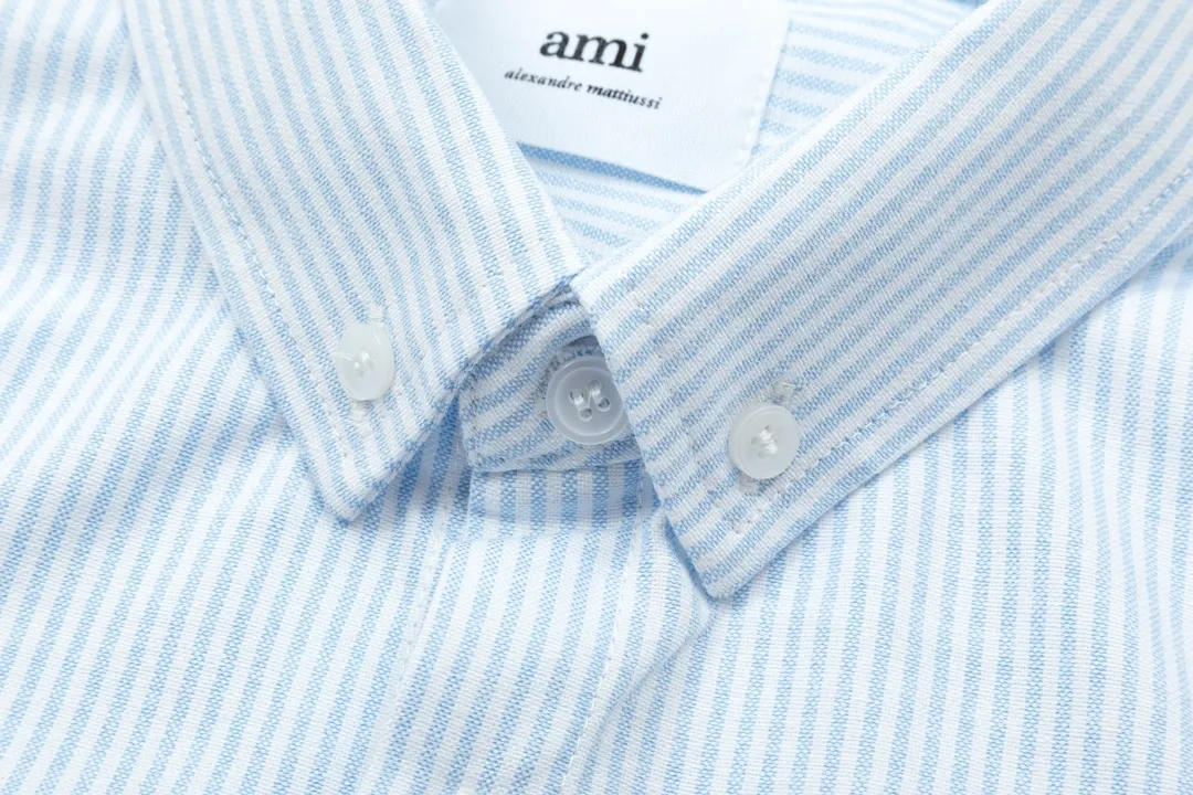 2202# AMI Paris Classic autumn red small heart embroidered on the chest Casual cotton striped long-sleeved Oxford shirt Original custom-made 180g pure cotton fabric Regular version Same style for men and women Colors: Black and white Gray and white Blue and white Green and white Pink and white Size: S-XL
