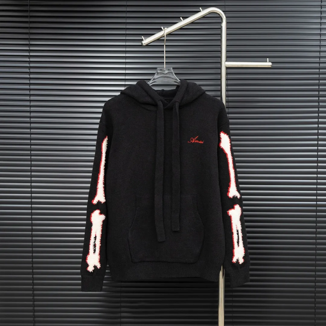 P360 Style: AMIRI Emile bone splicing hooded long-sleeved sweater Size: S-XXL Fabric: Wool blend Accessories: Full set of customized original accessories No gender distinction, same style for men and women