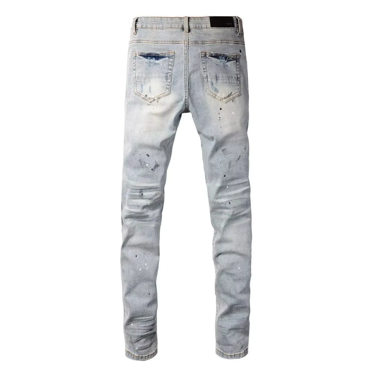 P220 💰 AMIRI patch embroidery jeans trousers AMIRI high street basic ripped tight elastic jeans trousers amiri brand jeans break the production process and cutting of the original jeans, the fabrics are softer and more comfortable Hand-sewn collar label Customized logo buttons Genuine leather tag Color: Picture color Size: 30-32-34-36