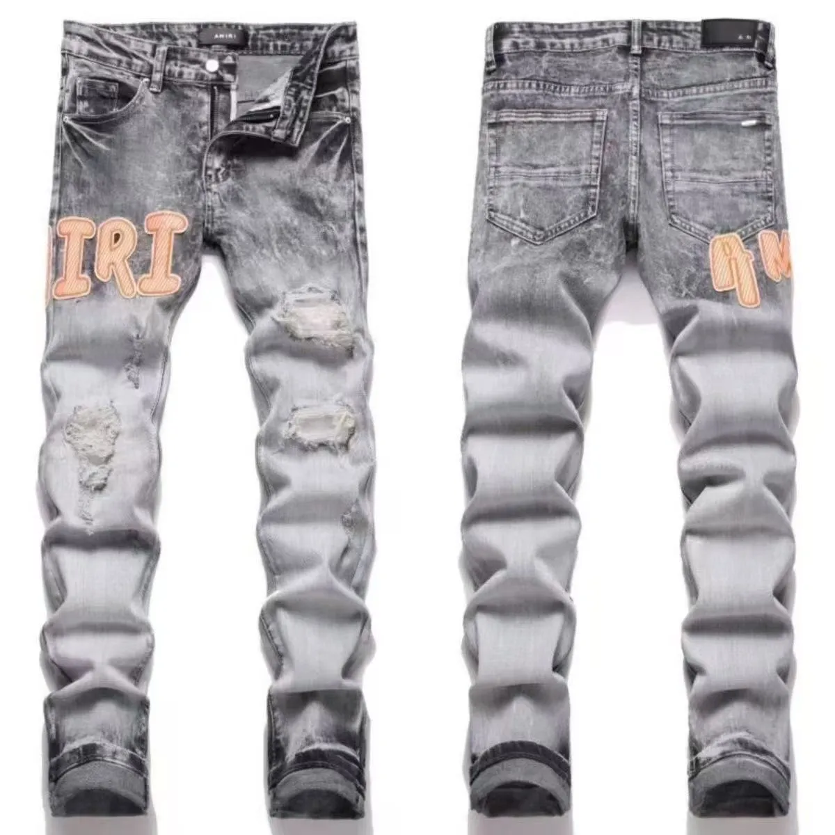 ￼#M17 P168💰 AMIRI patch embroidery jeans trousers AMIRI high street basic ripped tight elastic jeans trousers amiri brand jeans break the production process and cutting of the original jeans, the fabrics are softer and more comfortable Hand-sewn collar label Customized logo buttons Genuine leather tag Color: Picture color Size: 30-32-34-36
