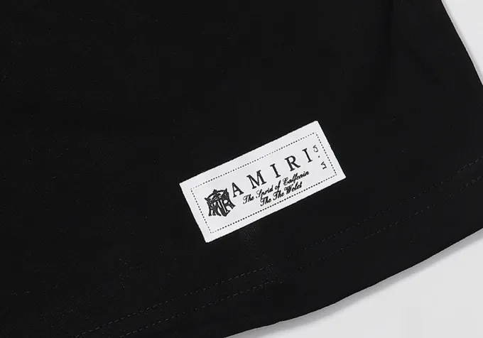 Style number: 701 P114 Fabric: 260g double yarn AMIRI 2025 spring and summer new logo round neck T-shirt high street same style for men and women loose classic letter short sleeves Color: White Black Size: S M L XL