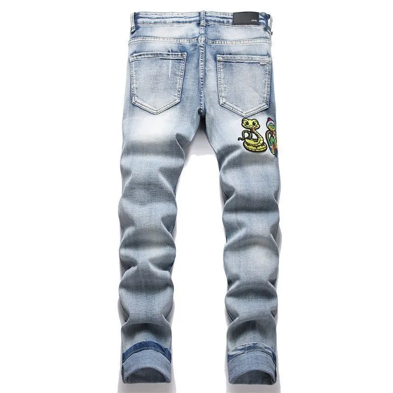 P168 💰 AMIRI patch embroidery jeans trousers AMIRI high street basic ripped tight elastic jeans trousers amiri brand jeans break the production process and cutting of the original jeans, the fabrics are softer and more comfortable Hand-sewn collar label Customized logo buttons Genuine leather tag Color: Picture color Size: 30-32-34-36