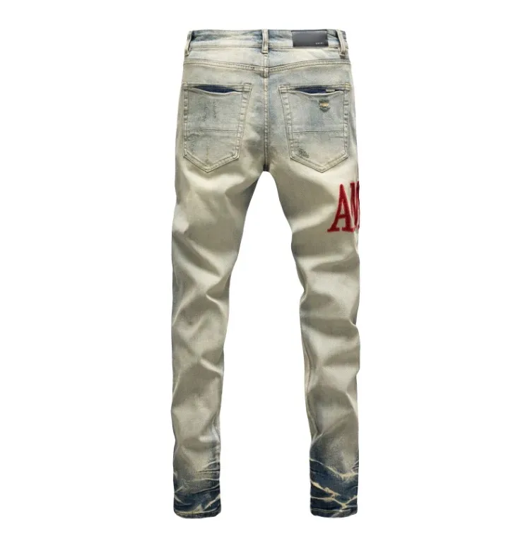 #N07 P246💰 (Top version) AMIRI hot high street jeans slim fit stretch washed knife cut trousers men's fashion AMIRI amiri is transliterated as Emil, which is the name of the founder. Mike Amiri, the founder of amiri, grew up in Los Angeles, USA. He was influenced by local street culture and Punk Rock since childhood, so he founded the amiri brand named after himself. A variety of trendy clothing meets the needs of different trendy players. Amiri clothing has novel and unique styles and is a well-known street brand in the United States. The styles and styles of many clothes are loved by many street photographers. The various clothing styles meet the dressing needs of different people, show their unique temperament, and show the trend of dressing. amiri's jeans are relatively famous. Not only do they have many styles, but the quality of the jeans is also very good. Many celebrities have also worn amiri brand jeans. Color: Picture color Size: 28, 30, 32, 34, 36 28 30 32 34 36 Waist 71 76 81 86 91 Qianlang 26.5 27.5 28.5 29.5 30.5 Hou Lang 37 38 39 40 41 Foot 14 14.8 15.6 16.4 17.2 Foreign Minister 100 102 104 106 107