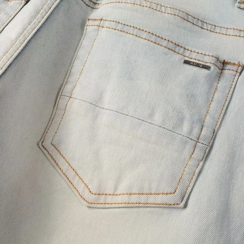 P168 💰 AMIRI patch embroidery jeans trousers AMIRI high street basic ripped tight elastic jeans trousers amiri brand jeans break the production process and cutting of the original jeans, the fabrics are softer and more comfortable Hand-sewn collar label Customized logo buttons Genuine leather tag Color: Picture color Size: 30-32-34-36