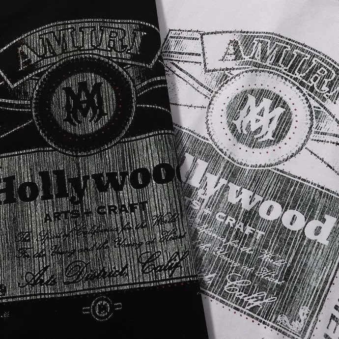 Style number: 726 P126 Fabric: 260g double yarn AMIRI 2025 spring and summer new logo round neck T-shirt high street men and women loose classic lettering silver short sleeves Color: black. White Size: S M L XL