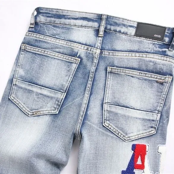 P168 💰 AMIRI patch embroidery jeans trousers AMIRI high street basic ripped tight elastic jeans trousers amiri brand jeans break the production process and cutting of the original jeans, the fabrics are softer and more comfortable Hand-sewn collar label Customized logo buttons Genuine leather tag Color: Picture color Size: 30-32-34-36