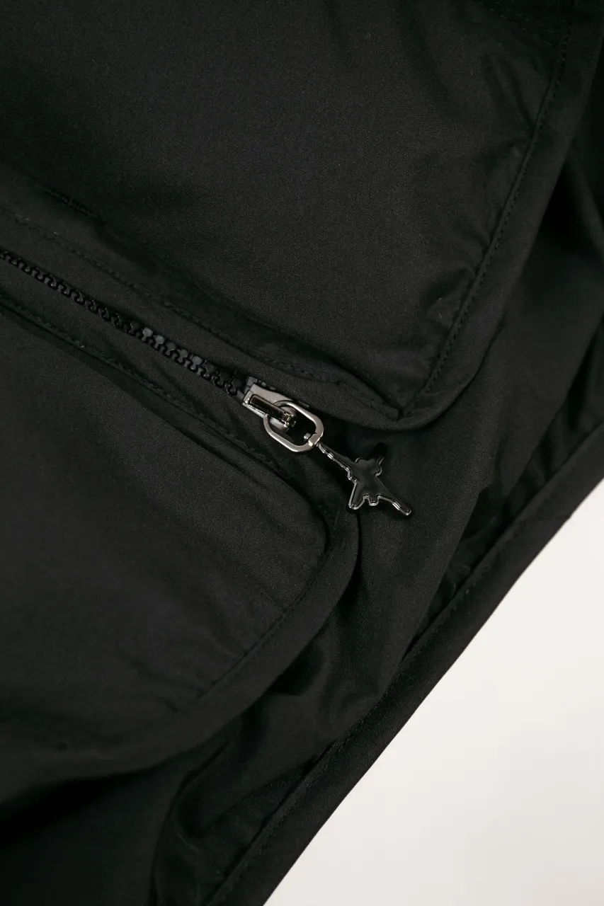 DIOR AND LEWIS HAMILTON JACKET Black technical fabric with removable sleeves This jacket is from the DIOR AND LEWIS HAMILTON limited series. Crafted from black technical fabric and embellished with DIOR AND LEWIS HAMILTON embroidery, the graphic design highlights the iconic Dior signature. With detachable sleeves, it can be worn in two different ways. It can be paired with jeans to create a low-key sporty look. DIOR AND LEWIS HAMILTON Embroidery and zip Knitted collar Detachable sleeves Front and internal flapless pockets Body: 100% nylon, Lining: 100% nylon