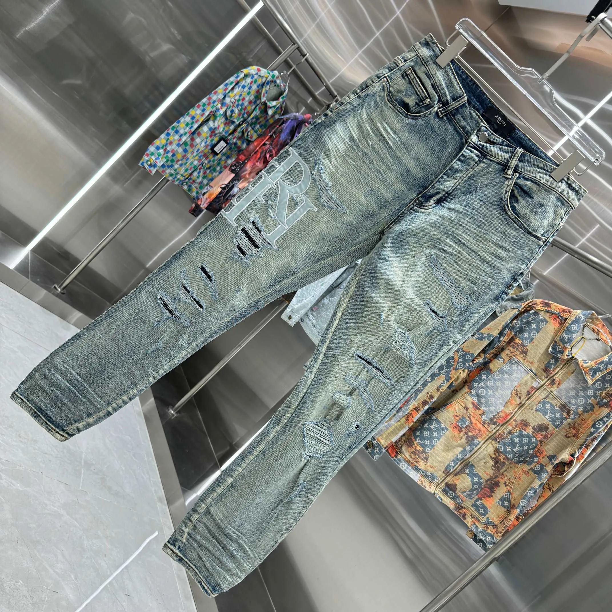 P290 Amiri ripped letter embroidery craft street fashion slim fit stretch jeans color blue size 30 32 34 36 38