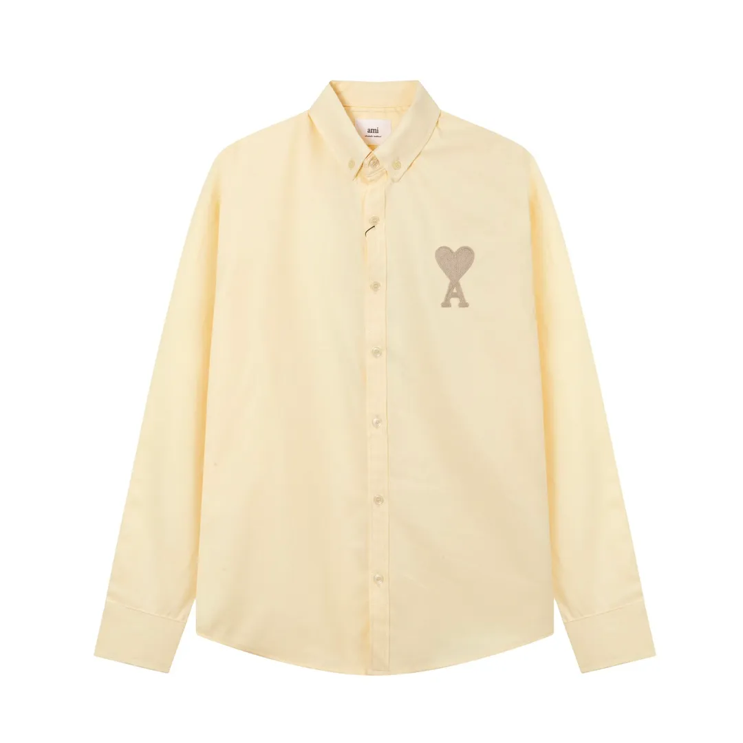 2205# AMI Paris Classic Autumn Towel embroidered with hearts in the same color on the chest Casual cotton solid color long-sleeved Oxford shirt Original customized 180g pure cotton fabric Regular version Same style for men and women Color: White Blue Yellow Aqua Pink Size: S-XL
