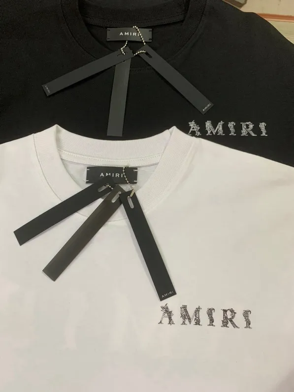 695 P120 AMIRI real shot black white hanging S. M. L. XL