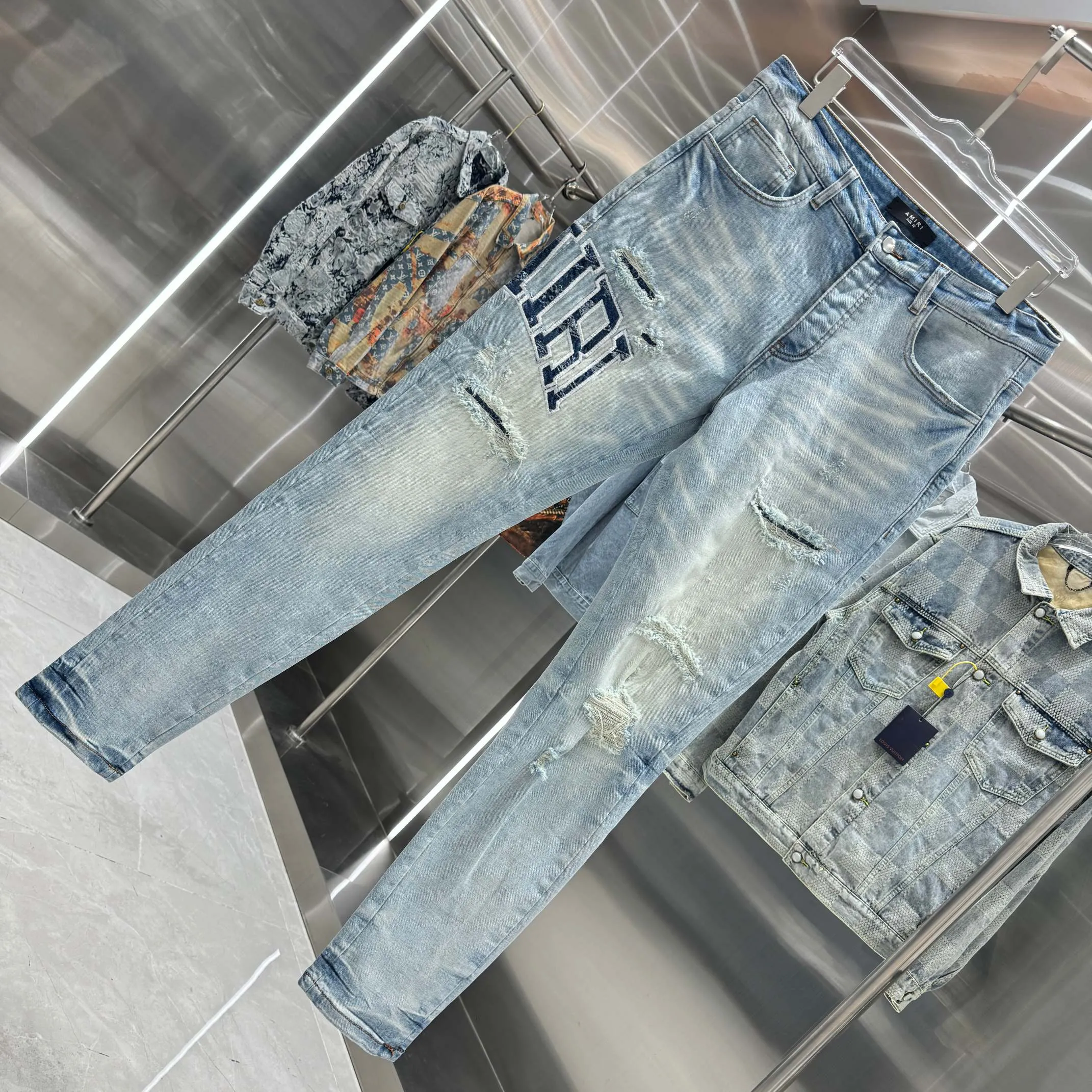 P290 Amiri ripped letter embroidered slim fit stretch jeans Color light blue Size 30 32 34 36 38