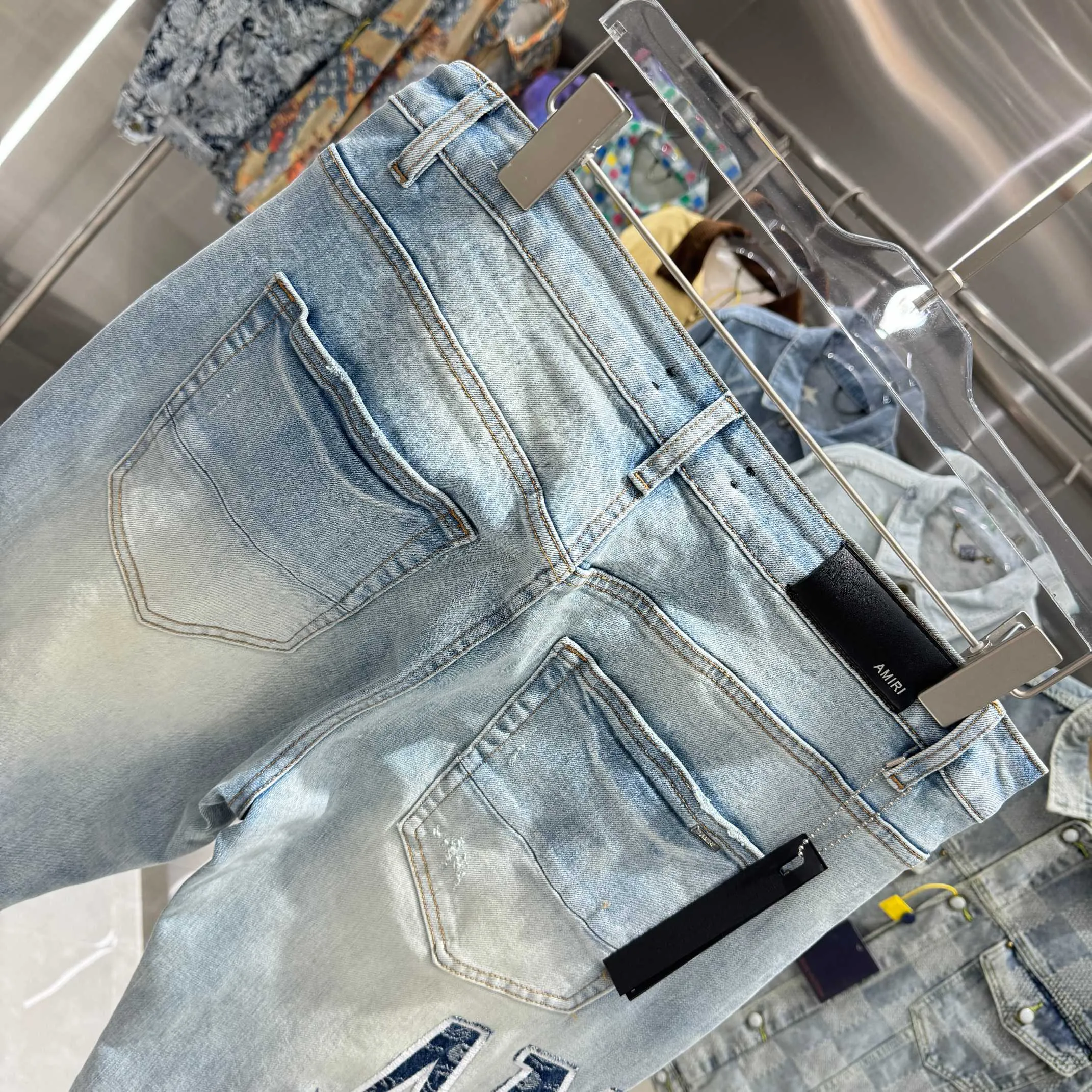 P290 Amiri ripped letter embroidered slim fit stretch jeans Color light blue Size 30 32 34 36 38