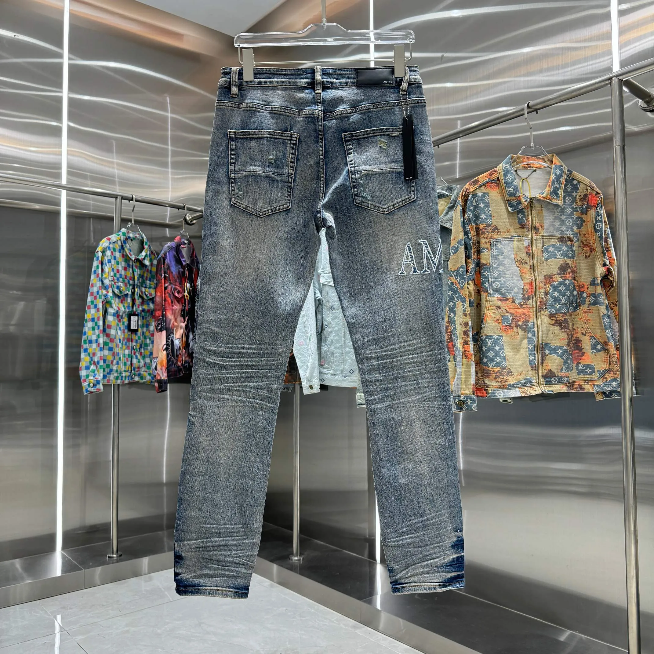 P290 Amiri ripped letter embroidery craft street fashion slim fit stretch jeans color blue size 30 32 34 36 38