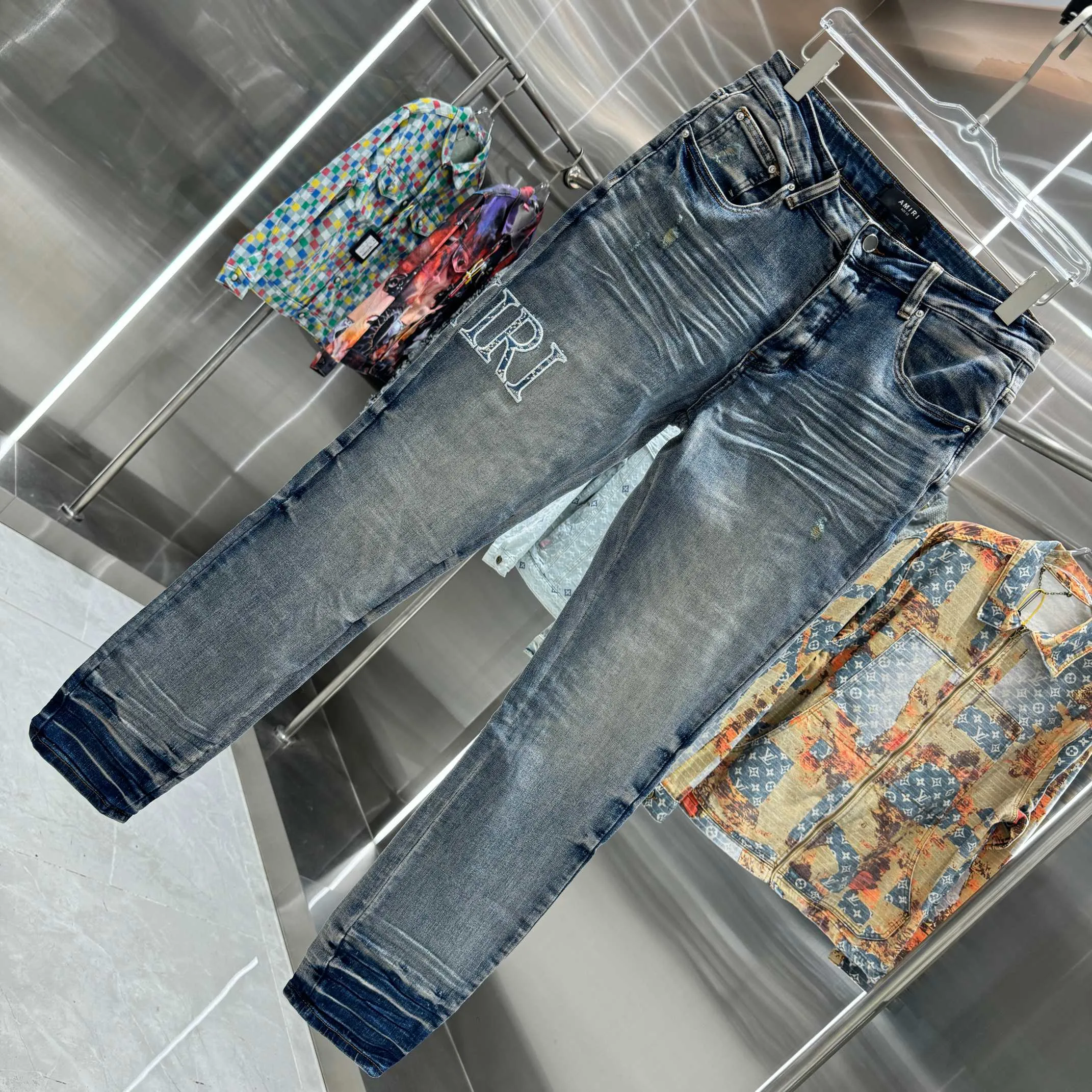 P290 Amiri ripped letter embroidery craft street fashion slim fit stretch jeans color blue size 30 32 34 36 38