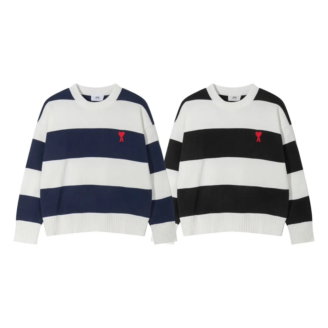 P170 A069# AMI Paris2023 new product. Carefully woven with cotton and wool blended yarn. It has dropped shoulder sleeves and a classic round neck. The blue and white striped body is simple and eye-catching. The red embroidery on the chest easily illustrates the brand identity. Same style for men and women. Color: Black and White, Orchid and White. Size: S-XL.