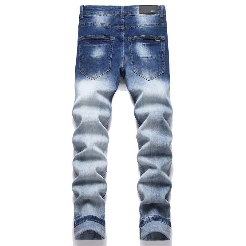 P180 Top replica AMIRI splash-ink medal patch embroidered jeans trousers AMIRI high street basic ripped tight stretch jeans trousers Amiriamiri is transliterated as Emil, which is the name of the founder. Mike Amiri, the founder of amiri, grew up in Los Angeles, USA. He was influenced by the local street culture Rock since he was a child, so he founded the amiri brand named after himself. A variety of trendy brand clothing meets the needs of different fashion players. Amiri clothing has novel and unique styles and is a well-known street brand in the United States. Many of its styles and styles are loved by many street photographers. Various clothing styles meet the needs of different people, show their unique temperament, and show the trend of dressing. amiri's jeans are relatively famous. Not only do they have many styles, but the quality of the jeans is also very good. Many celebrities have also worn amiri brand jeans.  The jeans of the amiri brand break through the production process and cutting of the original jeans. The fabrics are relatively soft and comfortable, and are not as hard as some jeans, which can irritate the skin and cause the skin to bleed when worn. Los Angeles trendy brand Amiri's jeans are made with great detail from tailoring to texture, adding wrinkles, bullet holes, damage and other details to add to the trendiness of the jeans. You can choose the style that suits you according to your own needs. Only when you wear a suitable style can you have a certain sense of fashion.  In recent years, high street has become a word that appears more and more frequently in men's clothing. High street style has also become an important direction for everyone's matching. High street related items are basically inseparable from oversize or off-shoulder tops. The lower body is matched with trackpants or tight-fitting denim. In my opinion, the most representative one is perhaps annihilation. Color; picture color Size: m l xl xxl