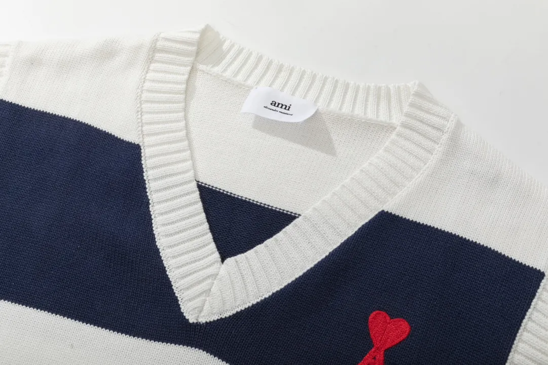 A088# AMI Paris2023 new sleeveless striped sweater vest vest with small love heart towel embroidery on the chest. Carefully woven with cotton and wool blended yarn. Same style for men and women. Color: black and white, blue and white. Size: S-XL.