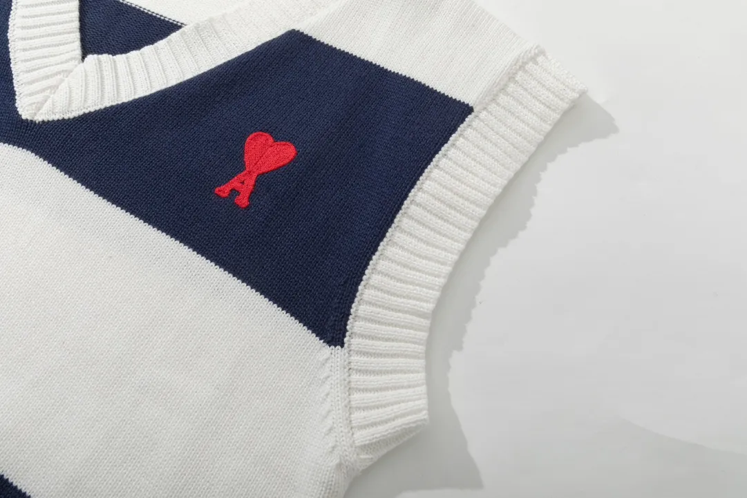 A088# AMI Paris2023 new sleeveless striped sweater vest vest with small love heart towel embroidery on the chest. Carefully woven with cotton and wool blended yarn. Same style for men and women. Color: black and white, blue and white. Size: S-XL.