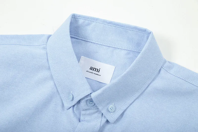 AMI Paris classic autumn red small heart embroidery on the chest, casual cotton solid color short-sleeved Oxford shirt, original custom-made 180g pure cotton fabric, loose off-shoulder version, same style for men and women. Color: brown, Baolan Tianlan, green, yellow, gray, white, pink, size: S-XL